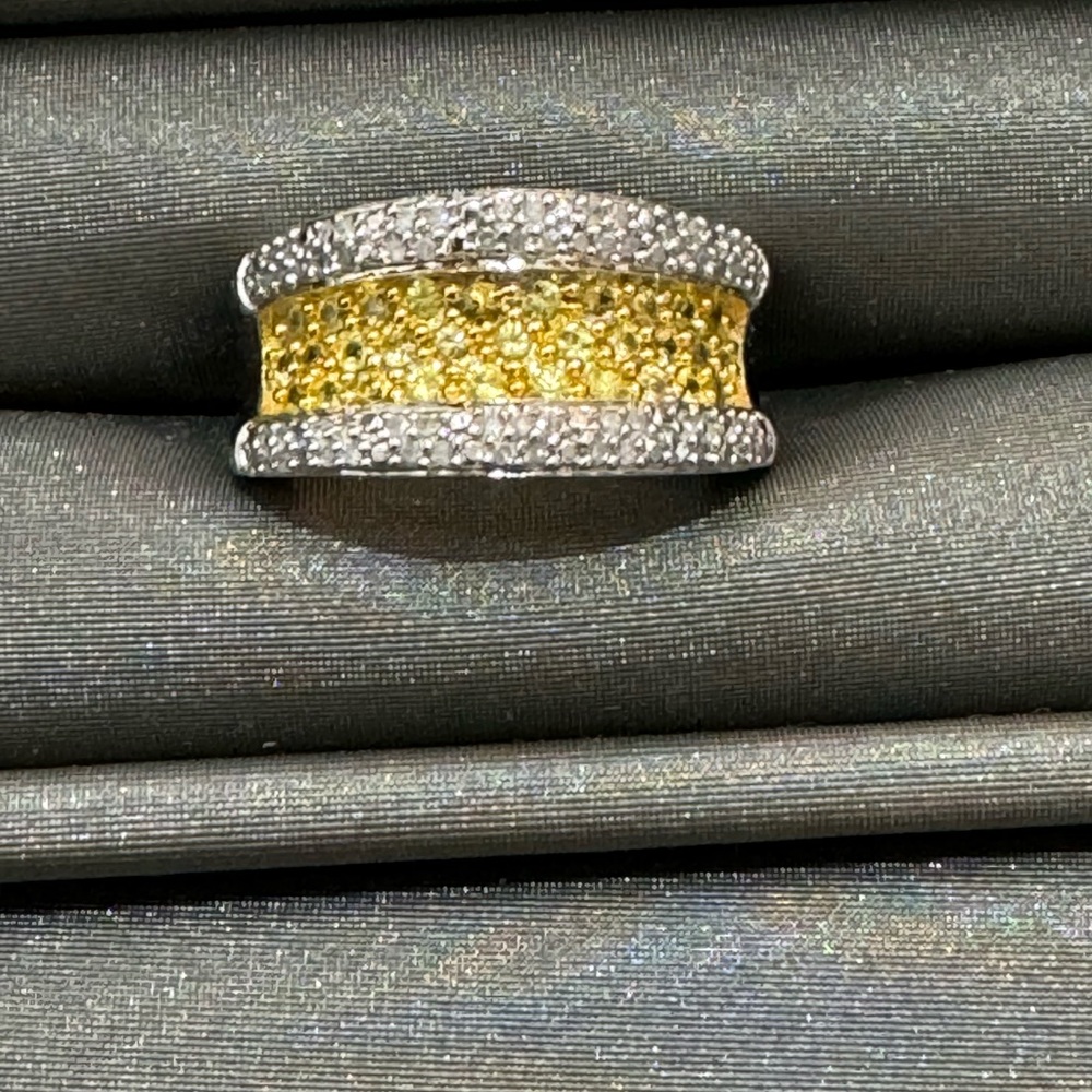 Sterling silver ring with diamonds and yellow citrine stones in center